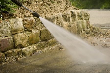 Hard surface softwashing